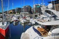 OSLO, NORWAY Ã¢â¬â AUGUST 17, 2016: People walking on modern district on street Stranden, Aker Brygge district with lux Royalty Free Stock Photo